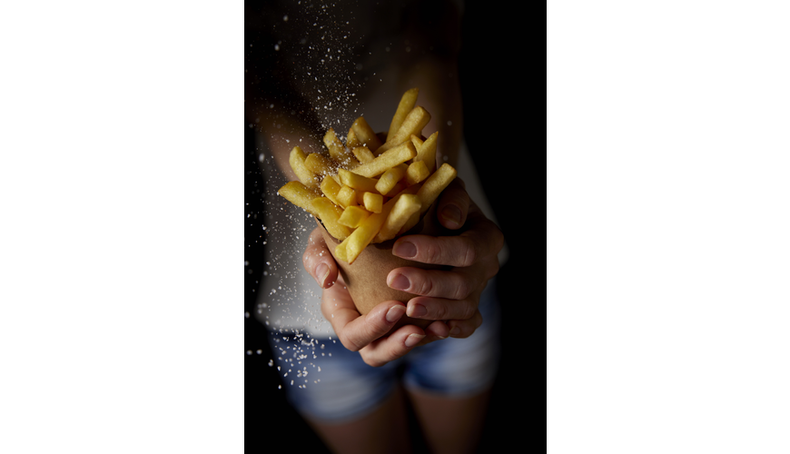 Woman holds fries